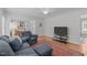 Inviting living area with hardwood floors and comfortable seating at 1007 Wellstone Cir, Apex, NC 27502