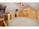 Spacious bonus room with vaulted ceilings, wood paneling and a versatile open layout at 103 Donna Pl, Cary, NC 27513