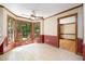Breakfast nook with tiled floors, bright windows, and a ceiling fan at 103 Donna Pl, Cary, NC 27513