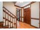 Inviting foyer with hardwood floors, wood trim, and a staircase to the left at 103 Donna Pl, Cary, NC 27513