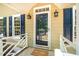 Welcoming front porch with a charming welcome mat and stylish black shutters at 103 Donna Pl, Cary, NC 27513