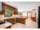 Kitchen with stainless appliances, granite countertops, and tile flooring at 103 Donna Pl, Cary, NC 27513