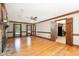 Spacious living room with hardwood floors, fireplace, and bright windows at 103 Donna Pl, Cary, NC 27513