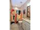 Cozy bathroom featuring a colorful shower curtain and granite countertop vanity at 1033 Cuthbert Ln, Durham, NC 27703