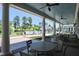 A covered patio area provides ample seating and views of the pool area at 1033 Cuthbert Ln, Durham, NC 27703