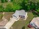 Overhead shot of property featuring mature landscaping, well-maintained lawn, and charming home exterior at 108 Christy Circle Ln, Clayton, NC 27520