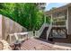 Enjoy the outdoors on this spacious wooden back deck, perfect for relaxing or entertaining guests at 108 Christy Circle Ln, Clayton, NC 27520