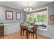 Cozy dining area features a window with views of the deck and outdoor scenery at 108 Christy Circle Ln, Clayton, NC 27520