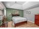 Comfortable bedroom with hardwood floors, natural light, and tasteful decor at 108 Christy Circle Ln, Clayton, NC 27520