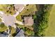 Aerial view showcases this landscaped home and neighborhood layout in a peaceful residential setting at 108 Yosemite Ct, Holly Springs, NC 27540