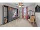 Bedroom featuring a decorative built in, a window with curtains, and a ceiling fan at 108 Yosemite Ct, Holly Springs, NC 27540