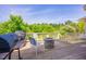 Outdoor deck featuring grilling station, fire pit, and seating, perfect for entertaining at 1097 Trentini Ave, Wake Forest, NC 27587