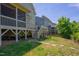 Spacious backyard features a deck, screened porch, and a playful swing set at 1097 Trentini Ave, Wake Forest, NC 27587