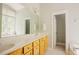 Spacious bathroom with double vanity, mirror and access to tub at 1097 Trentini Ave, Wake Forest, NC 27587