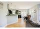 Open kitchen and dining area with a breakfast bar, pendant lighting, and a table with bench seating at 1097 Trentini Ave, Wake Forest, NC 27587