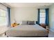 Comfortable main bedroom with bedside tables and plush bedding at 1097 Trentini Ave, Wake Forest, NC 27587