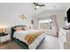 Comfortable main bedroom featuring a bed, vaulted ceiling, neutral decor, and natural light at 1109 Banworth Ct, Mebane, NC 27302