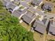 Overhead view of the neighborhood, showing property roof, yards, and landscaping at 1129 Santa Cruz St, Wake Forest, NC 27587