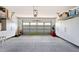 Clean, spacious garage with white storage cabinets and plenty of room for vehicles and tools at 1129 Santa Cruz St, Wake Forest, NC 27587