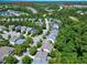 Overhead view of a beautiful residential neighborhood with lush green trees and landscaping with a small lake at 1141 Brookhill Way, Cary, NC 27519