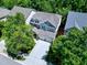 Aerial view of this home shows its well-kept landscaping, driveway, and three-car garage at 1141 Brookhill Way, Cary, NC 27519
