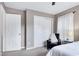 Bright bedroom with closet access and a comfortable reading nook for relaxing at 1141 Brookhill Way, Cary, NC 27519