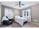 Cozy bedroom with natural light and comfortable reading nook for relaxing at 1141 Brookhill Way, Cary, NC 27519