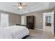 The main bedroom has a large wardrobe, neutral paint, and an ensuite bathroom at 1141 Brookhill Way, Cary, NC 27519