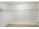 Spacious walk-in closet with carpet and shelving for optimal storage space at 1141 Brookhill Way, Cary, NC 27519