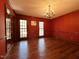 Elegant dining room featuring hardwood floors and a chandelier at 11813 Edgewater Ct, Raleigh, NC 27614