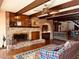 Cozy living room with a brick fireplace and wooden accents at 11813 Edgewater Ct, Raleigh, NC 27614