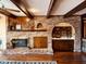 Charming living room with brick fireplace and custom built-ins at 11813 Edgewater Ct, Raleigh, NC 27614