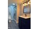 Modern bathroom featuring a glass-enclosed shower and stylish vanity at 11813 Edgewater Ct, Raleigh, NC 27614