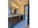 Bathroom featuring a granite vanity, a large mirror, and a view into the bedroom at 11813 Edgewater Ct, Raleigh, NC 27614