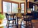 Cozy dining area with wood floors, and a view to the exterior at 11813 Edgewater Ct, Raleigh, NC 27614