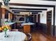 Kitchen with hardwood floors, wood cabinets, a center island, and stainless steel appliances at 11813 Edgewater Ct, Raleigh, NC 27614