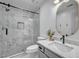 Updated bathroom features walk-in shower with marble and modern vanity at 1225 Fanning Dr, Wake Forest, NC 27587