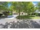 Charming house with mature shade trees, lush lawn and a spacious driveway at 1225 Fanning Dr, Wake Forest, NC 27587