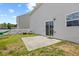 Backyard offers a patio with seating and a view of the home with sliding glass doors at 1303 Bent Willow Dr, Durham, NC 27704