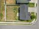 An aerial view of a fenced backyard with a manicured lawn and patio seating area, perfect for outdoor gatherings at 1303 Bent Willow Dr, Durham, NC 27704