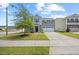 Charming two-story home with gray siding, well-manicured lawn, and a two-car garage at 1303 Bent Willow Dr, Durham, NC 27704