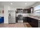 Modern kitchen featuring stainless steel appliances and ample cabinet space at 1303 Bent Willow Dr, Durham, NC 27704
