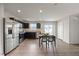 Well-equipped kitchen with stainless steel appliances and dining area at 1303 Bent Willow Dr, Durham, NC 27704