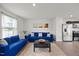 Comfortable living room featuring hardwood floors, and neutral-colored walls at 1303 Bent Willow Dr, Durham, NC 27704