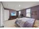Spacious main bedroom boasts plenty of natural light, a television, and a ceiling fan at 1303 Bent Willow Dr, Durham, NC 27704