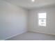 Cozy bedroom with soft, neutral carpet and bright window at 1730 Pie Filling Dr, Haw River, NC 27258