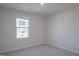 This is a simple bedroom with a window at 1730 Pie Filling Dr, Haw River, NC 27258