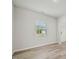 Bedroom with hard surface floors and a window looking onto the street at 1730 Pie Filling Dr, Haw River, NC 27258