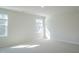 This is a bright bedroom, with lots of natural light at 1730 Pie Filling Dr, Haw River, NC 27258