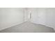 Bedroom features neutral walls, carpet, and doorways at 1730 Pie Filling Dr, Haw River, NC 27258